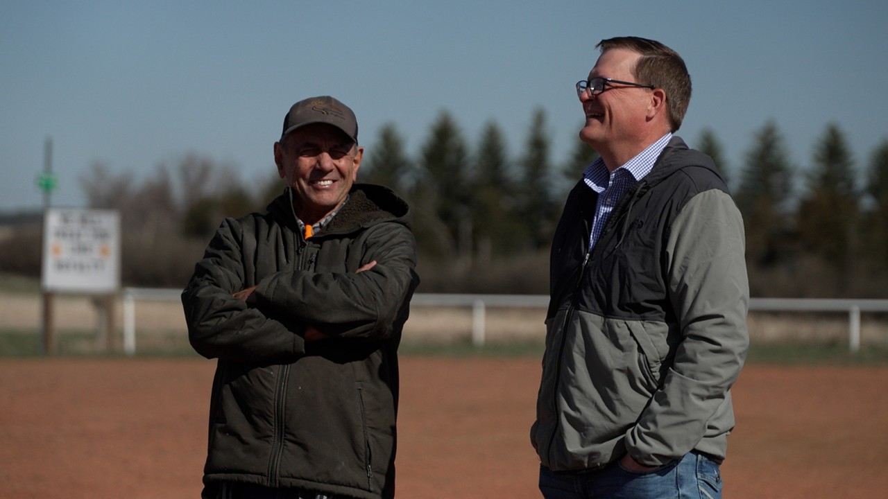 Andrew McCrea interviewing a man.
